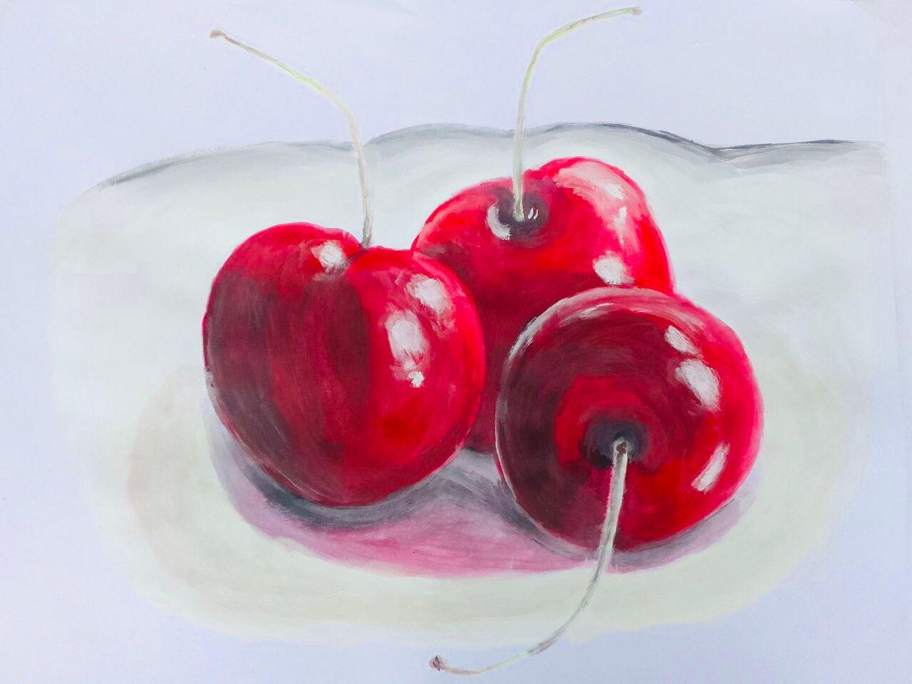 Three glossy red cherries with their stems, casting a soft pink shadow on a pale ground